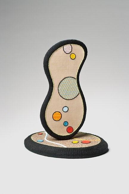 #551
2008
Gator board, wood, cotton, silk, beads, 14 x 12 x 9 in. ?Joyce Melander-Dayton